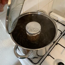 Boiling/steaming jar inside of the pot