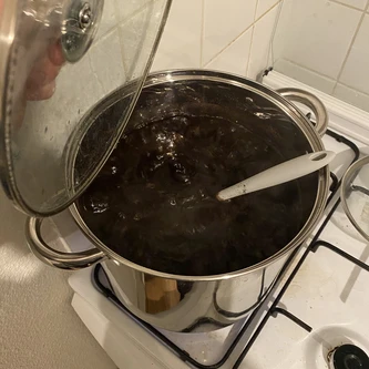 Boiling the coco coir inside a pot